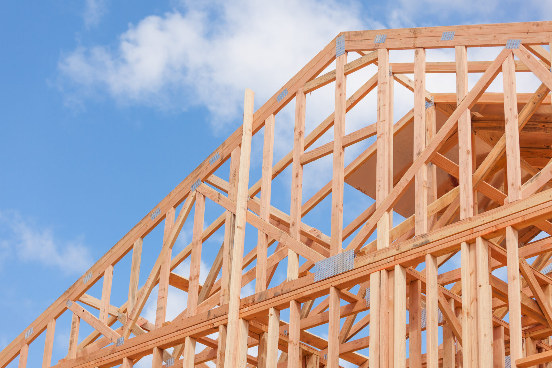 Wood Home Framing Abstract At Construction Site. Wood Home Framing Abstract At Construction Site.
